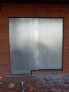 door openings secured with steel screens