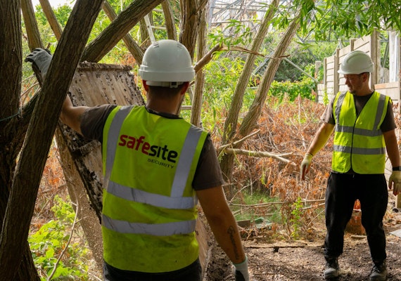 SafeSite operatives removing rubbish