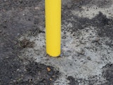Heavy Duty Bollards Permanently Concreted Into The Ground