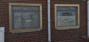 2 broken windows in a commercial property