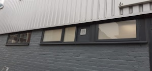 windows in a commercial property ready for boarding up