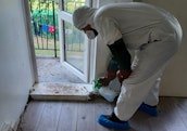 Surface spraying during cleaning process