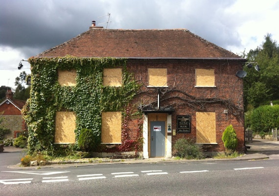 boarding up large vacant property - pub