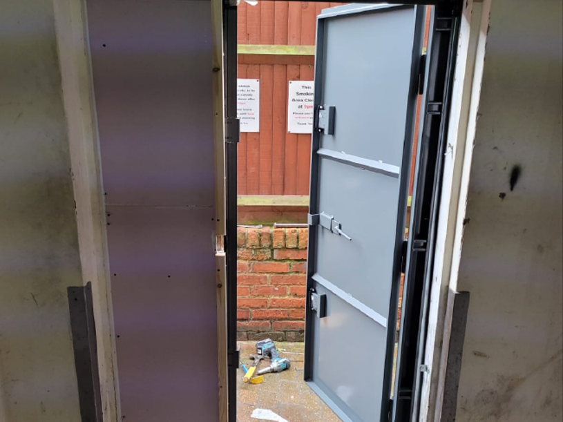 Securing Rear Door of Public House – London