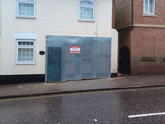 Vacant Property Secured with a Steel Door and Sheet